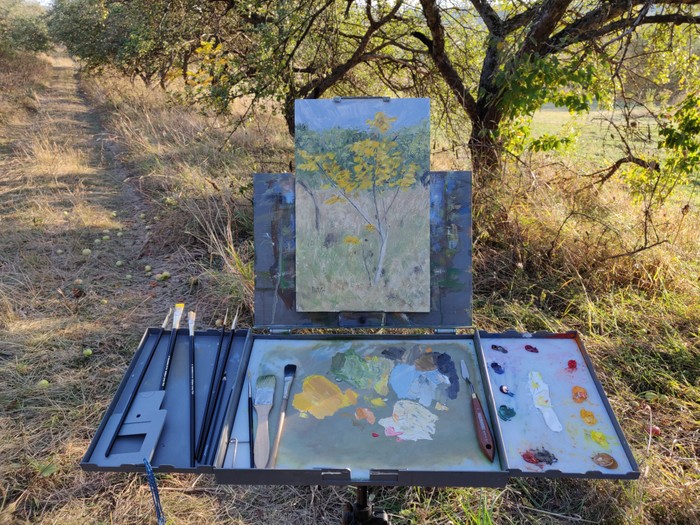 Autumn tree landscape painting on easel