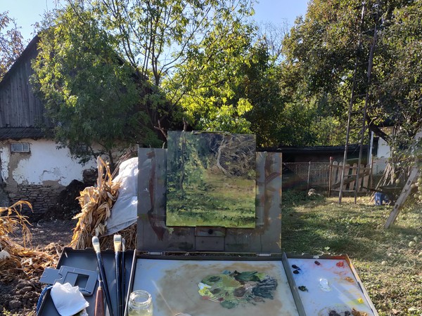 Apple tree and dried branches painting on easel