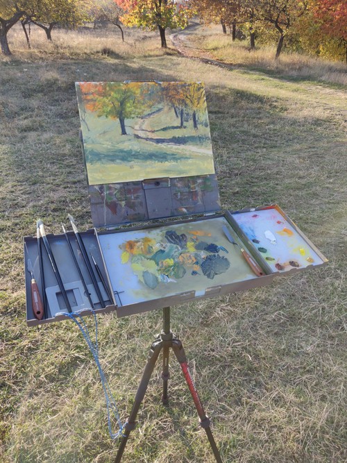 Autumn trees road painting easel